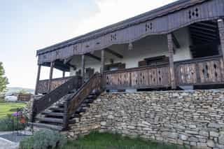 Poza cu exteriorul cabanei Casuta de pe Dealul Cojocului